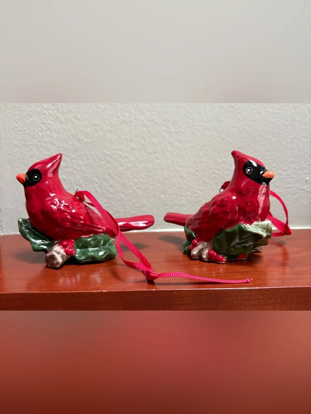 Pair of Blue Sky Clayworks Cardinals Sitting on a Holly Branch Ornaments 2020